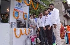 Marketing Strategy of Sandhar Technologies + group of people outside a health clinic